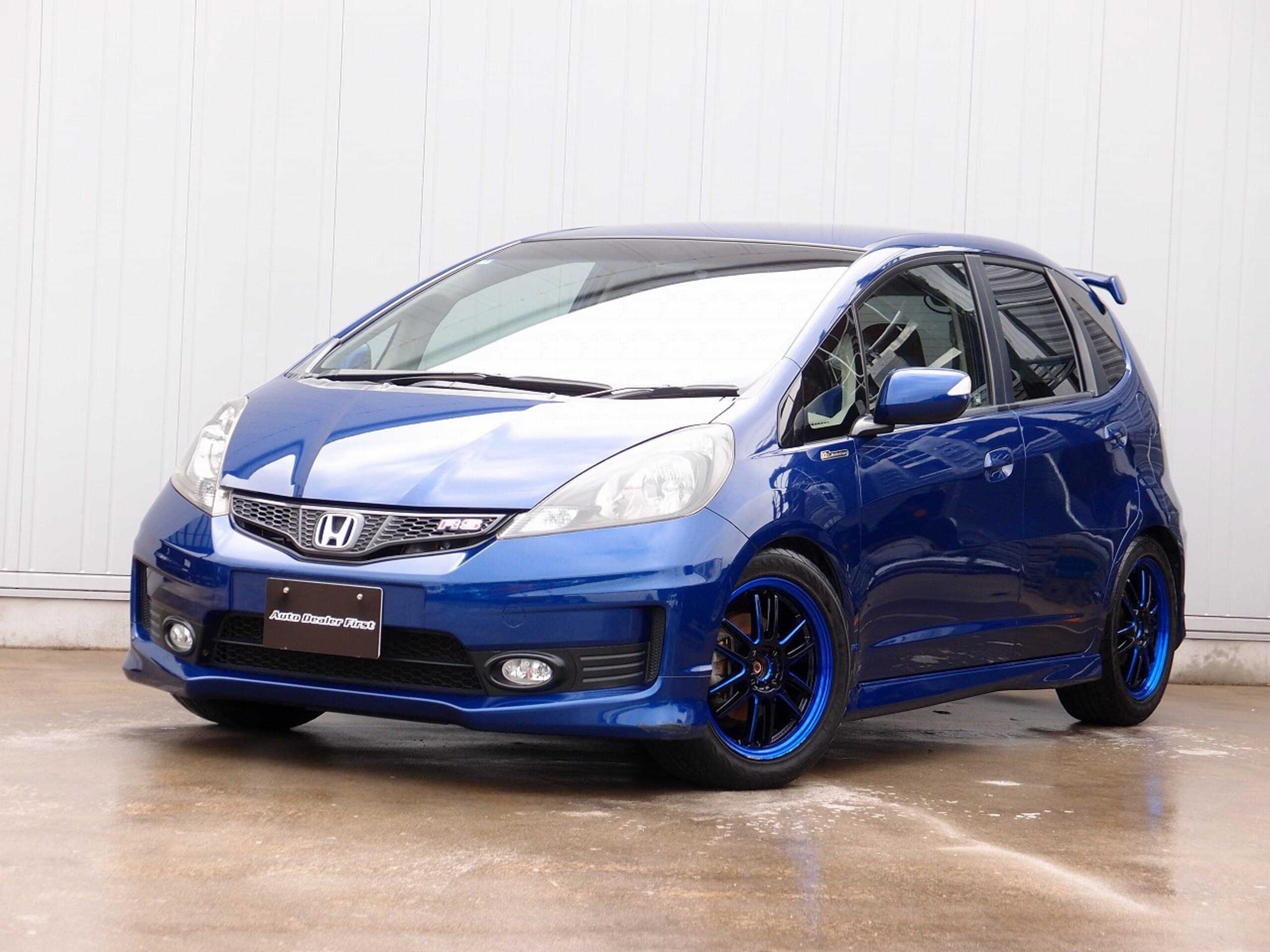 フィット 1.5 RS 10thアニバーサリー カロッツエリアSD地デジナビ BLTZ車高調 RAYSグラムライツ57アルティメイト16AW タイヤ8分山 無限リアウイング トラストマフラー バックカメラ 過記録簿9枚 ETC 前後ドラレコ RECAROシート 6MT 取説